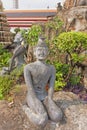 Decorative figures in rock garden. Wat Pho Temple of the Recli